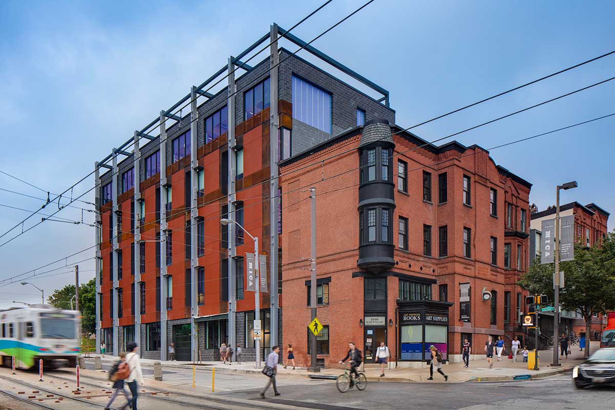 A daytime exterior shot of the MICA Dolphin Design Center